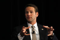 Illinois Rep. Aaron Schock speaks on the panel at the George W. Bush Institute forum at the Art Institute in Chicago in September 2012. Schock resigned Tuesday amid controversy over his spending habits. (Nancy Stone/Chicago Tribune/Tribune News Service via Getty Images)