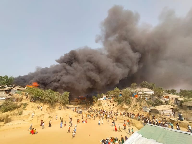 A fire is seen at a Balukhali refugee camp in Cox's Bazar