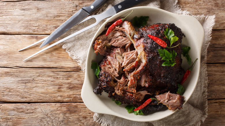 pernil in pot with cutlery