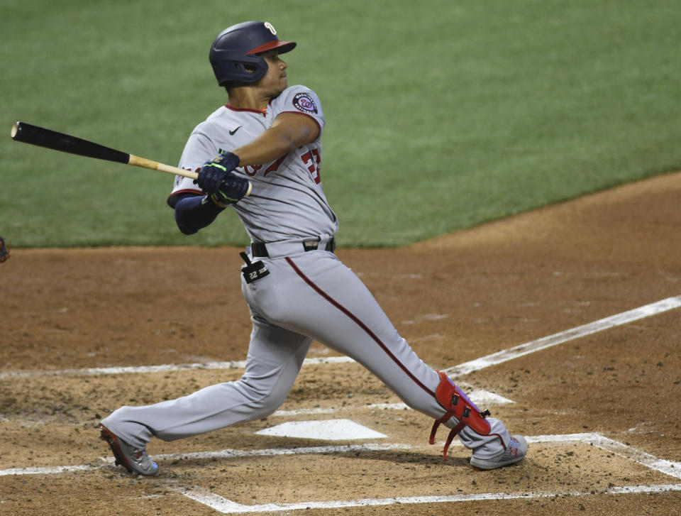 Washington Nationals Juan Soto singles during the second inning of game two of a doubleheader against the Miami Marlins, Sunday, Sept. 20, 2020, in Miami. (AP Photo/Gaston De Cardenas)