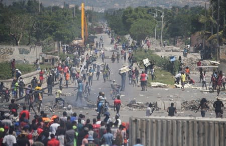 Protesters march during a demonstration demanding the resignation of Haitian President Jovenel Moise in Port-au-Prince