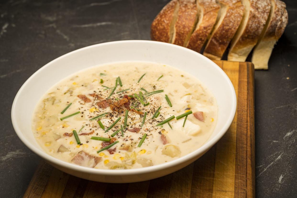 Photograph showing a bowl of fresh home made corn chowder.