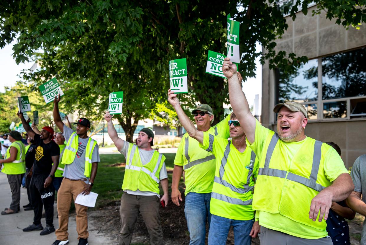 Mike West, right, joined with his fellow union members represented by AFCSME Council 31, representing employees from CWLP, Public Works and clerical workers for the City of Springfield, as they line the block in front of Municipal Center West as they hold a rally to make their case for a fair contract prior to the Springfield City Council Committee of the Whole meeting in Springfield, Ill., Tuesday, July 27, 2021. [Justin L. Fowler/The State Journal-Register]