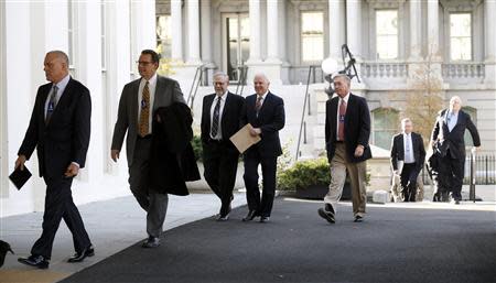 Health insurance chief executives arrive at the White House to meet with U.S. President Barack Obama in Washington November 15, 2013. REUTERS/Kevin Lamarque