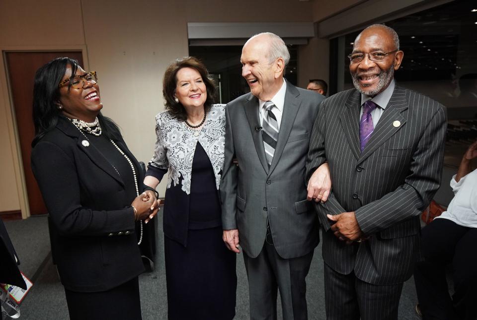 President Russell M. Nelson of The Church of Jesus Christ links arms with the Rev. Dr. Amos Brown in Detroit in 2019.