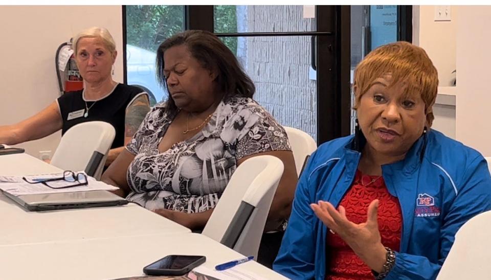 Realtor Lucy Stewart Desmore, right, of Realty Pros Assured talks about the growing need for affordable and workforce housing in the Daytona Beach area at a meeting at the offices of Mid-Florida Housing Partnership on April 14, 2022.
