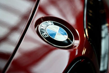 FILE PHOTO: A logo of the German luxury carmaker BMW is seen during the company's annual news conference in Munich, Germany, March 21, 2018.   REUTERS/Michael Dalder/File Photo