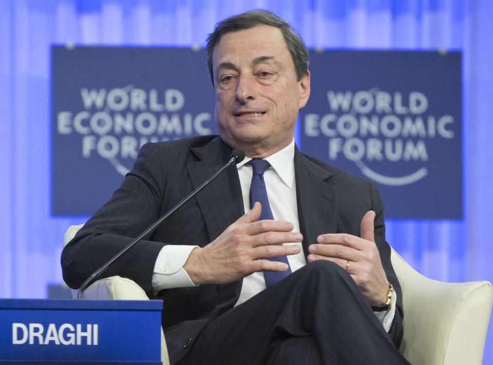 Mario Draghi, President of the European Central Bank, speaks during a session of the World Economic Forum in Davos, Switzerland, Friday, Jan. 24, 2014. (AP Photo/Michel Euler)