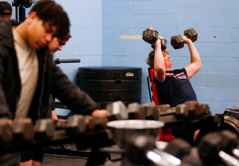 Glendale defensive end Kellen Lindstrom works out in the schools weight room on Friday, March 17, 2023.