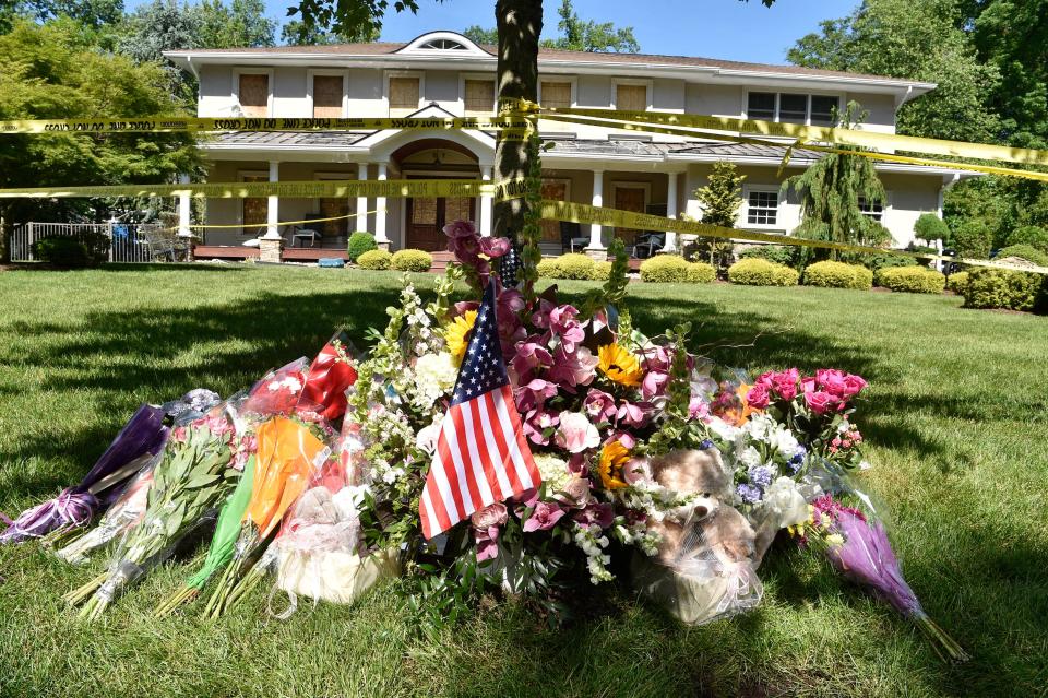 Flowers, photos and stuffed animals are placed on the front lawn of a home where Riley Boyle, 17, died in a fire at her home on Bonnie Way in Allendale. The fire occurred on June 4, 2022 in the late afternoon.