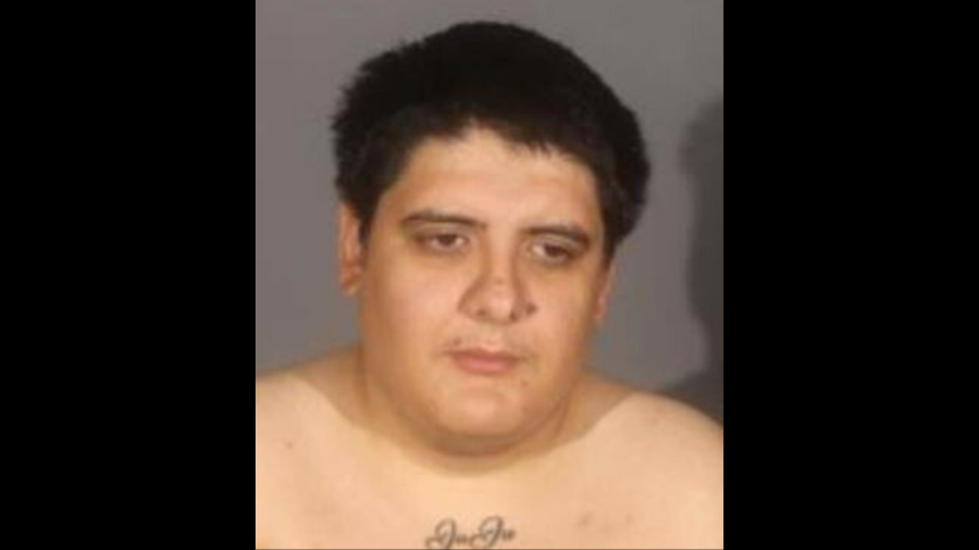 The suspect, Andrew Louie Sandoval, is seen in a booking photo from the South Gate Police Department on July 25, 2024.