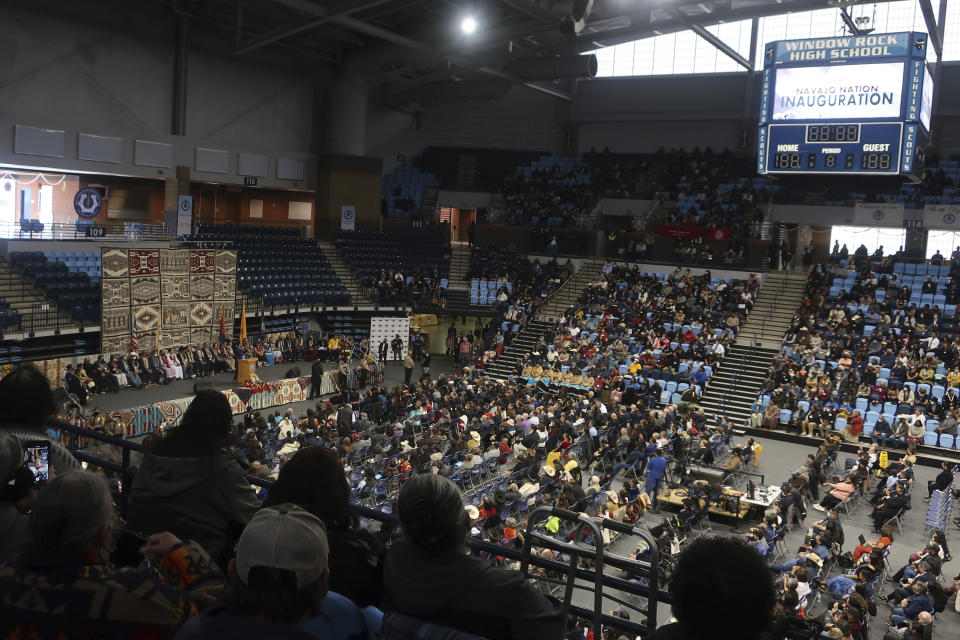 Thousands attend the Navajo Nation inauguration Tuesday, Jan. 10, 2023 at the Bee Holdzil Fighting Scouts Event Center in Fort Defiance, Ariz. Navajo President Buu Nygren is the youngest person elected to the position, while Vice President Richelle Montoya is the first woman to hold that office. (AP Photo/Felicia Fonseca)