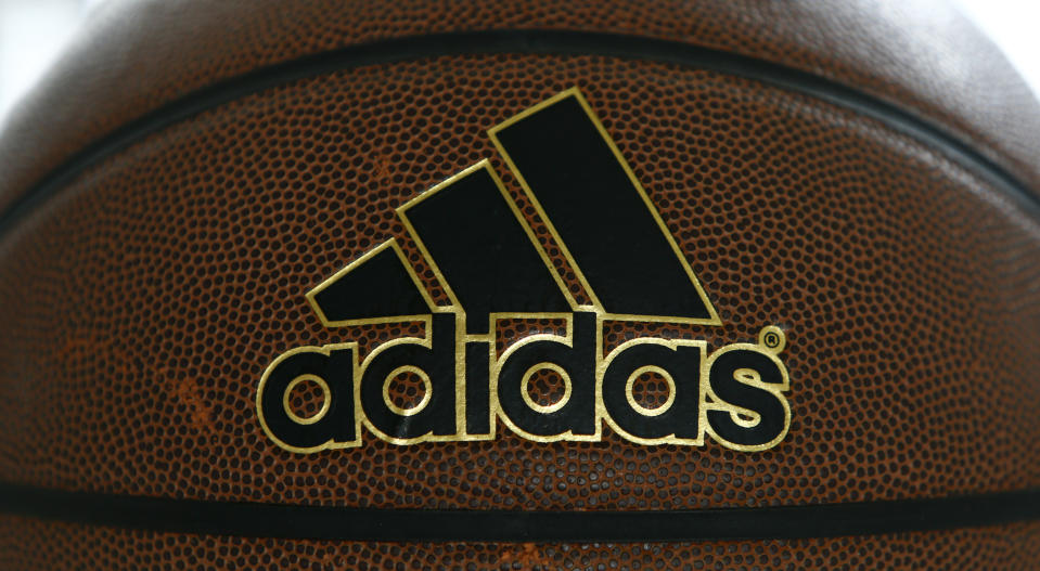 An Adidas logo is pictured on a basketball after the annual news conference at teh company's headquarters in the northern Bavarian town of Herzogenaurach, near Nuremberg March 3, 2016.  REUTERS/Michaela Rehle