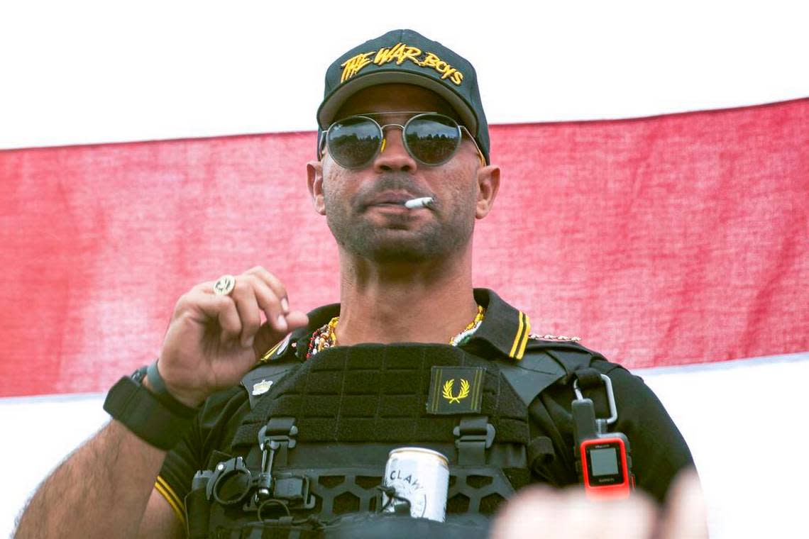 FILE - In this Sept. 26, 2020, file photo, Proud Boys leader Henry “Enrique” Tarrio wears a hat that says The War Boys during a rally in Portland, Ore. The leader of the far-right Proud Boys extremist group, Tarrio, was arrested Tuesday on a conspiracy charge for his suspected role in a coordinated attack on the U.S. Capitol to stop Congress from certifying President Joe Biden’s 2020 electoral victory.