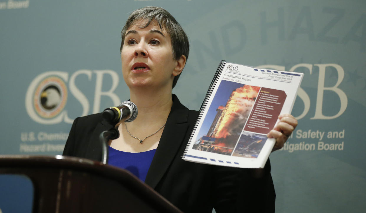 Kristen Kulinowski, the interim director of the U.S. Chemical Safety Board, holds a copy of the agency's report on the Pryor Trust blowout, which was released Wednesday. (Photo: ASSOCIATED PRESS)