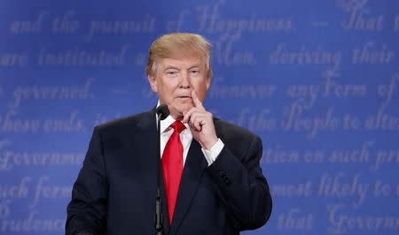 Republican U.S. presidential nominee Donald Trump speaks during the third and final debate with Democratic nominee Hillary Clinton (not pictured) at UNLV in Las Vegas, Nevada, U.S., October 19, 2016. REUTERS/Rick Wilking