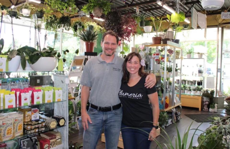 Elisha Hodge and partner Bryan Mayes inside her shop Plumeria Botanical Boutique Thursday, Aug. 11, 2022, in Battle Creek. Hodge plans to open a second Plumeria location inside the former Lakeview Hardware store, 660 Capital Ave. SW, in mid-2023.