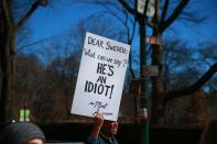 <p>A demonstrator holds up a sign during the “Not My President’s Day” rally at Central Park West in New York City on Feb. 20, 2017. (Gordon Donovan/Yahoo News) </p>