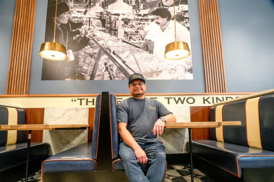 Jason Sugarman at his Maven's Delicatessen in Pawtucket. As a seasoned restaurateur, he hoped for a successful opening. But the crowds of diners compelled him to pause for a few days to regroup.