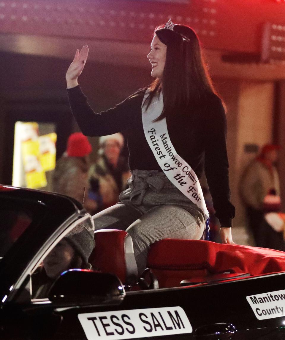 Manitowoc County Fairest of the fair Tess Salm waves during the 33rd Annual Lakeshore Holiday Parade, Wednesday, November 24, 2021, in Manitowoc, Wis.