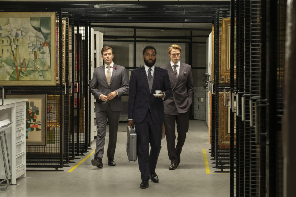 (L-r) JACK CUTMORE-SCOTT, JOHN DAVID WASHINGTON and ROBERT PATTINSON in Warner Bros. Pictures’ action epic "TENET," a Warner Bros. Pictures release.  (Warner Bros.)