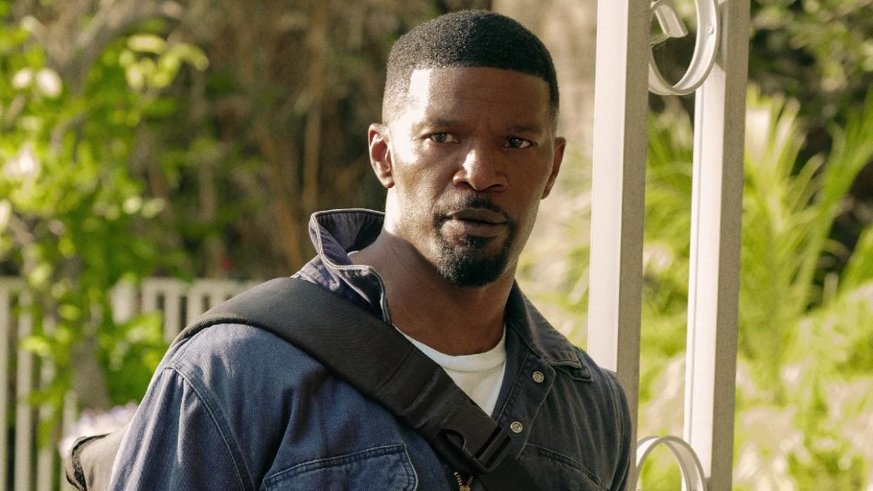  Jamie Foxx looking to the left in Day Shift. 