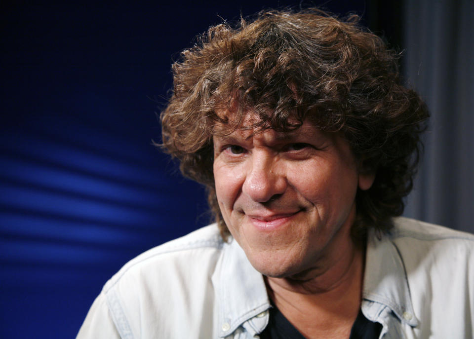 FILE - In this Aug. 13, 2009 file photo, producer Michael Lang poses for a portrait in New York. The co-creator and promoter of the 1969 Woodstock music festival that served as a touchstone for generations of music fans, Michael Lang has died. A spokesperson for Lang's family says the 77-year-old had been battling non-Hodgkin lymphoma and passed away Saturday, Jan. 8, 2022 in a New York City hospital. (AP Photo/Jeff Christensen, file)