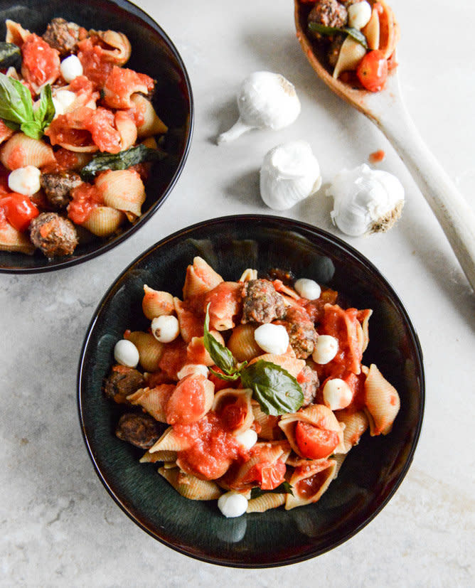 <strong>Get the <a href="http://www.howsweeteats.com/2013/04/caprese-shells-with-mini-meatballs/" target="_blank">Caprese Shells with Mini Meatballs recipe</a> by How Sweet It Is</strong>