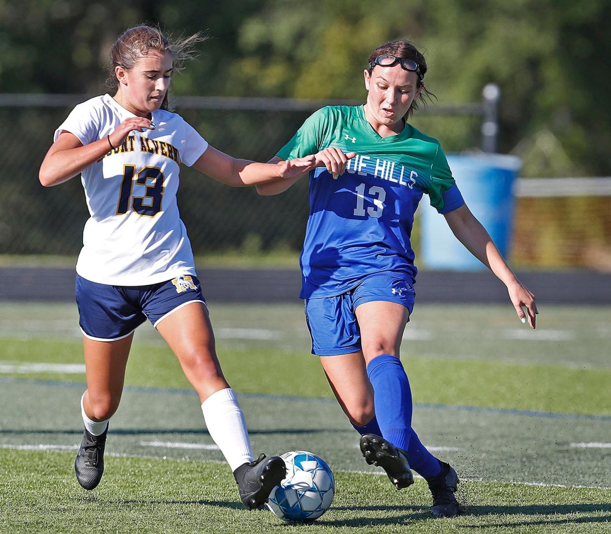 Blue Hills Regional Technical School's Emily Lehane, right, battles for ball possession against Mount Alvernia's Bridget Ryan on Thursday, Sept. 15, 2022.