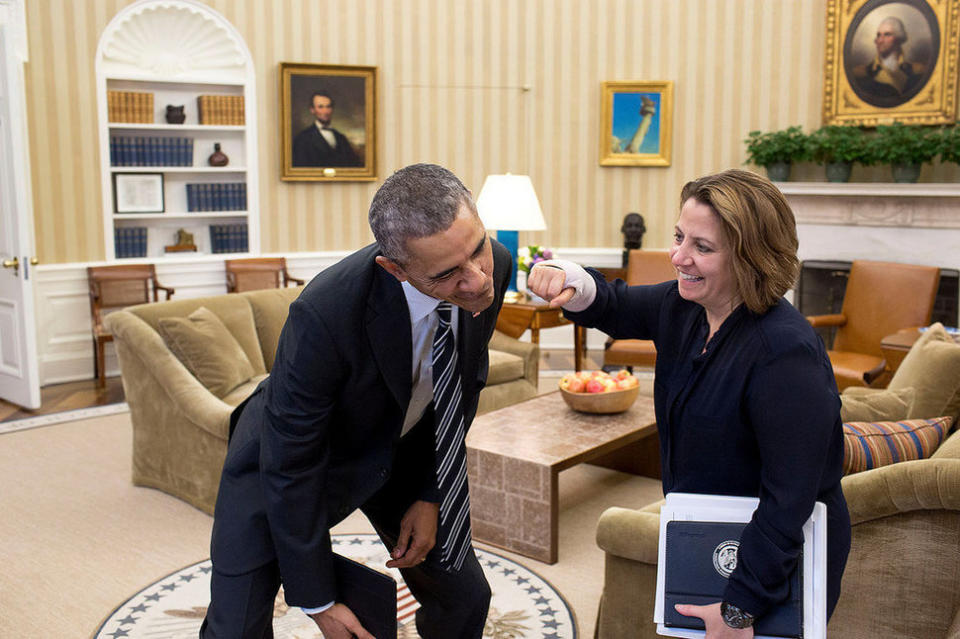 Lisa Monaco, assistant to the president for homeland security and counterterrorism, pretends to punch the president with her cast in the Oval Office on March 5, 2015.