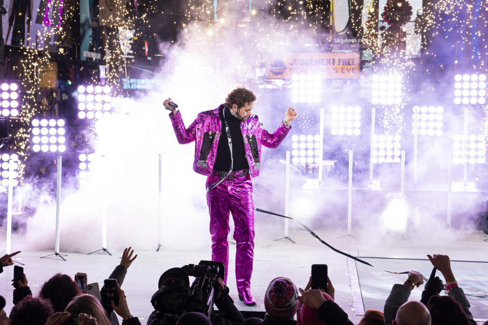 Post Malone performs at the Times Square New Year's Eve celebration on Tuesday, Dec. 31, 2019, in New York. (Photo by Ben Hider/Invision/AP)