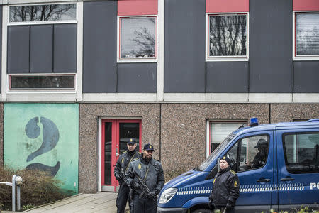 Danish police, in cooperation with the Police Intelligence Department, search an apartment block in Ishoej, south of Copenhagen, Denmark April 7, 2016. REUTERS/Asger Ladefoged/Scanpix Denmark