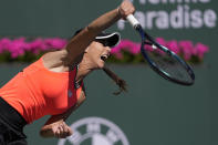 Sorana Cirstea, of Romania, serves to Iga Swiatek, of Poland, at the BNP Paribas Open tennis tournament Thursday, March 16, 2023, in Indian Wells, Calif. (AP Photo/Mark J. Terrill)