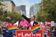 <p>DOMA plaintiffs Stuart Gaffney and John Lewis celebrate at San Francisco Gay Pride after the Supreme Court's decision to legalize same-sex marriage across the country.</p>