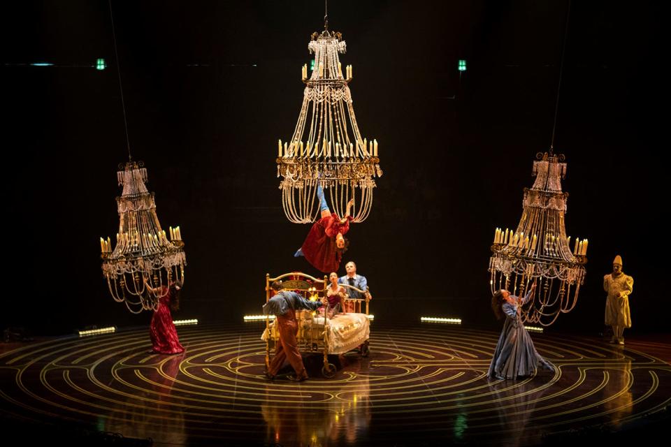 In Cirque du Soleil's "Corteo," aerialists perform on and around huge light fixtures.