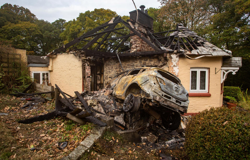 A driver has been arrested after car crashed into a house on the A38 in Cornwall. 19th October 2020  See SWNS story SWPLcrash. This dramatic picture shows the damage caused after a car crashed into a house before bursting into flames. The motorist ploughed into the home on the A38 causing both the property and car to catch fire. The roof was burned away, leaving charred beams and smoke damaged walls. The trapped driver was taken to Derriford Hospital in Plymouth, Devon, following the crash in Bodmin, Cornwall on Sunday at around 7.30pm.See SWNS story SWPLcrash. This dramatic picture shows the damage caused after a car crashed into a house before bursting into flames. The motorist ploughed into the home on the A38 causing both the property and car to catch fire. The roof was burned away, leaving charred beams and smoke damaged walls. The trapped driver was taken to Derriford Hospital in Plymouth, Devon, following the crash in Bodmin, Cornwall on Sunday at around 7.30pm.