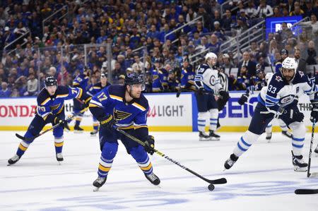 Apr 20, 2019; St. Louis, MO, USA; St. Louis Blues left wing Jaden Schwartz (17) handles the puck during the third period in game six of the first round of the 2019 Stanley Cup Playoffs against the Winnipeg Jets at Enterprise Center. Mandatory Credit: Jeff Curry-USA TODAY Sports