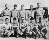 The crew of the United States Army Air Forces B-29 Superfortress ‘Bockscar’, which dropped the atomic bomb ‘Fat Man’ on the Japanese city of Nagasaki on Aug. 9, 1945. Front row, left to right: flight engineer John D. Kuharek, gunner and assistant flight engineer Ray Gallagher, tail gunner Albert Dehart, radio operator Abe Spitzer, unknown. Back row, left to right: bombardier Raymond ‘Kermit’ Beahan, navigator James Van Pelt, co-pilot Charles Donald Albury, co-pilot Fred Olivi and pilot Major General Charles W. Sweeney. (Photo: FPG/Hulton Archive/Getty Images)