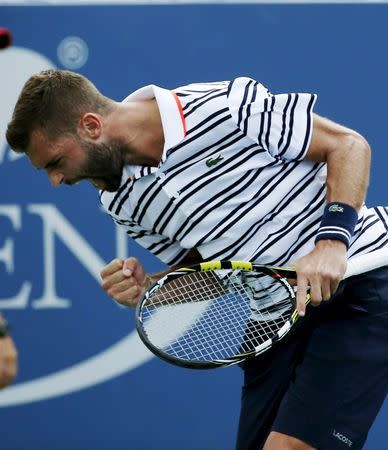 Benoit Paire of France celebrates a point during his win over Kei Nishikori of Japan during their match at the U.S. Open Championships tennis tournament in New York, August 31, 2015. REUTERS/Mike Segar