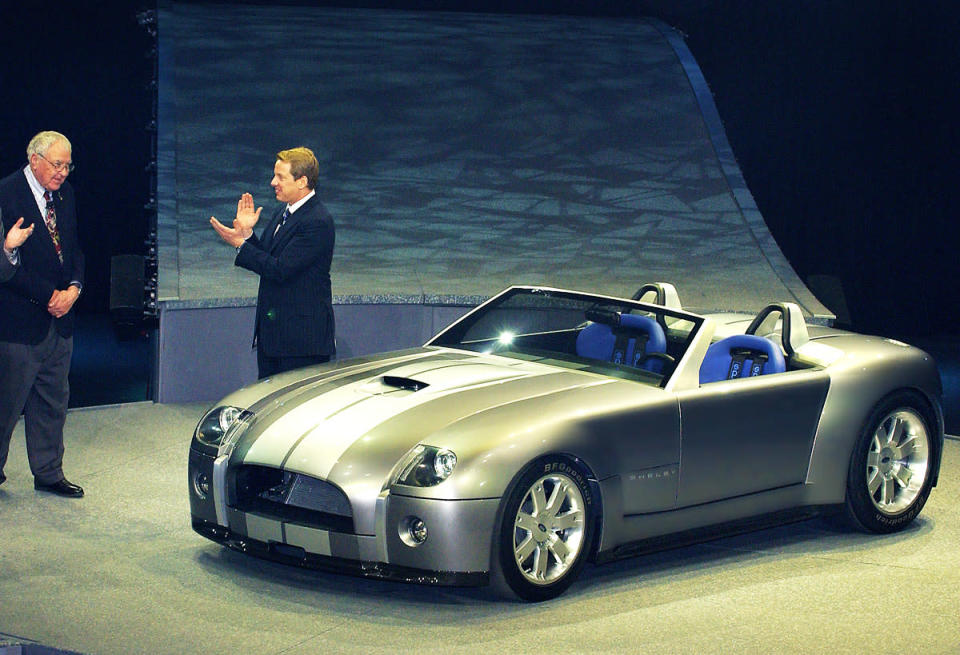 Ford Motor Company CEO William Clay Ford Jr. and Carroll Shelby following the introduction of the Ford Shelby Cobra Concept at the North American International Auto Show. (1/4/2004)