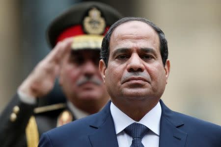 Egyptian President Abdel Fattah al-Sisi attends a military ceremony in the courtyard of the Hotel des Invalides in Paris, France, November 26, 2014. REUTERS/Charles Platiau/Files