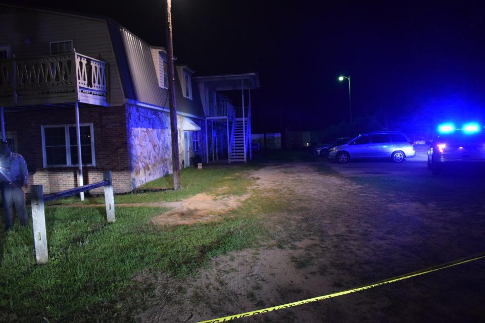 Crime scene tape surrounds home in the 600 block of Drypoint Lane where a shootout resulted in the hospitalization of three people, May 14, 2024.