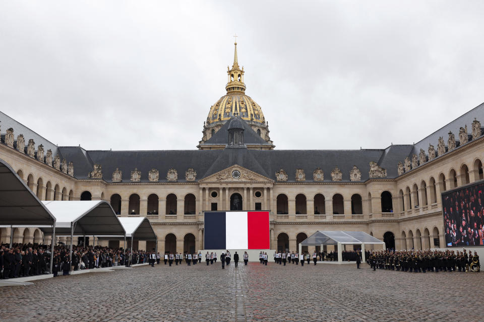 French President attends a ceremony for the French victims of the Oct.7 2023 Hamas' attack, at the Invalides monument, Wednesday, Feb.7, 2024. France is paying tribute to French victims of Hamas' Oct. 7 attack, in a national ceremony led by President Emmanuel Macron four months after the deadly assault in Israel that killed some 1,200 people, mostly civilians, and saw around 250 abducted.(Gonzalo Fuentes/Pool via AP)