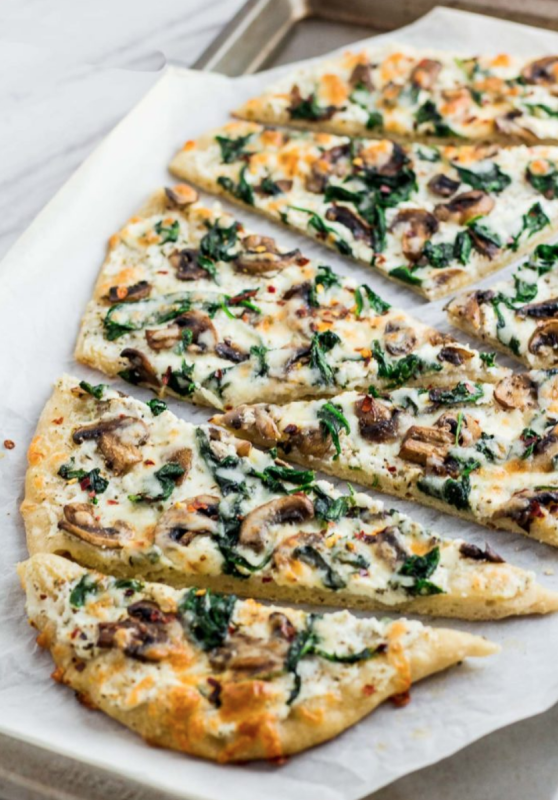 <p>My Eclectic Bites</p><p>Mushroom spinach white pizza with creamy ricotta with sauteed mushroom and spinach is a match made in heaven! It takes less than 30 minutes to make this soon-to-be favorite white pizza!</p><p><strong>Get the recipe: <a href="https://www.myeclecticbites.com/30-minutes-mushroom-spinach-white-pizza/" rel="nofollow noopener" target="_blank" data-ylk="slk:30-Minute Mushroom Spinach White Pizza;elm:context_link;itc:0;sec:content-canvas" class="link rapid-noclick-resp">30-Minute Mushroom Spinach White Pizza</a></strong></p>