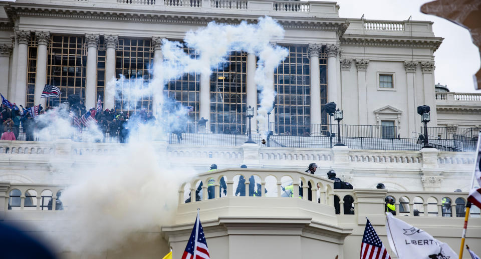 Rioters attacking the Capitol on January 6.
