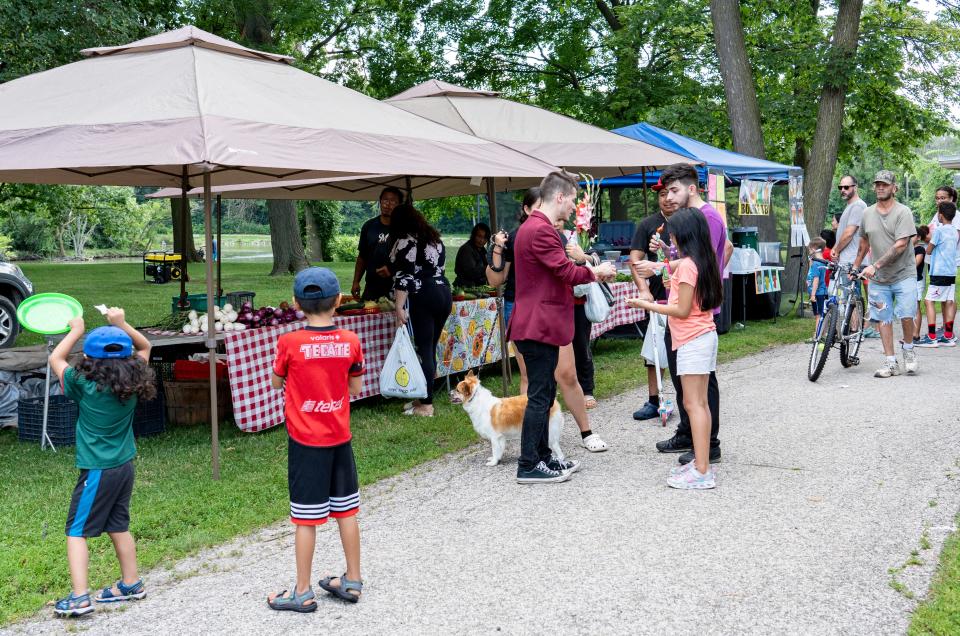 The Jackson Park Farmers Market allows residents to take a stroll through the park, shop local vendors, grab a bite to eat, and enjoy live music and activities on Thursday, July 21, 2022 in Milwaukee, Wis.