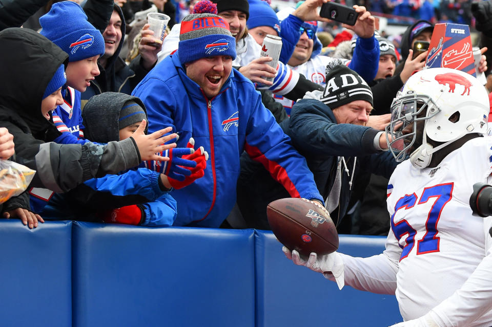 Nov 3, 2019; Orchard Park, NY, USA; Buffalo Bills offensive guard <a class="link " href="https://sports.yahoo.com/nfl/players/29063/" data-i13n="sec:content-canvas;subsec:anchor_text;elm:context_link" data-ylk="slk:Quinton Spain;sec:content-canvas;subsec:anchor_text;elm:context_link;itc:0">Quinton Spain</a> (67) hands the game ball to a fan against the Washington Redskins during the fourth quarter at New Era Field. Mandatory Credit: Rich Barnes-USA TODAY Sports