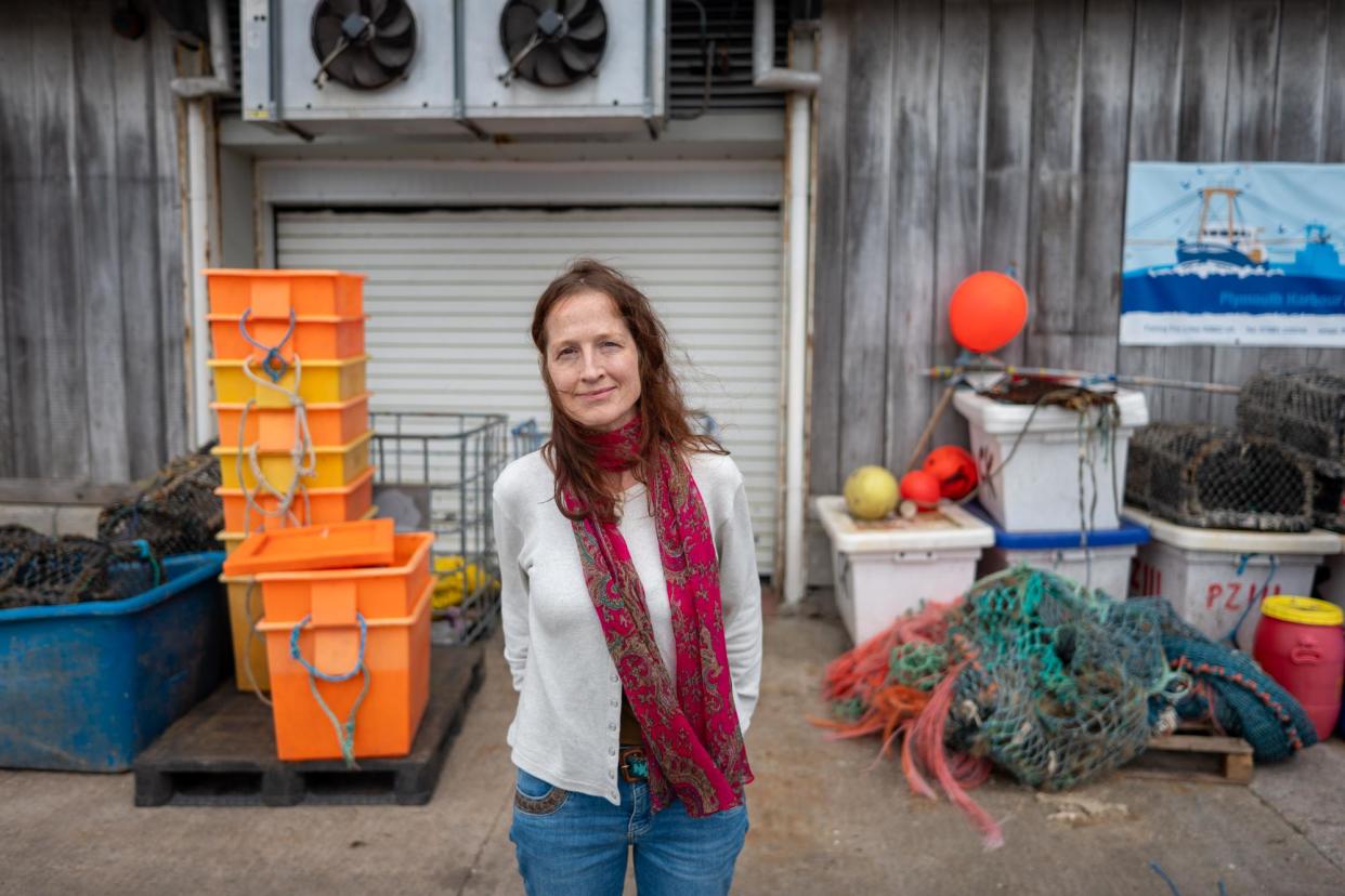 <span>Caroline Bennett, founder of Sole of Discretion, a collective of small-scale fishers, pictured at Plymouth Fisheries in Devon.</span><span>Photograph: Jim Wileman/the Observer</span>