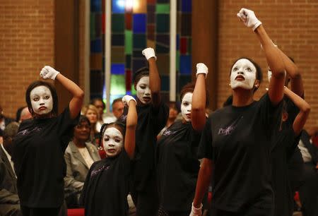 Spiritual dancers perform during a memorial service for American author and poet Maya Angelou at Mount Zion Baptist Church in Winston-Salem, North Carolina May 29, 2014. REUTERS/Chris Keane