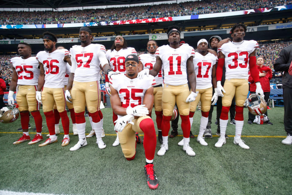 Teams are now following up kneeling with action. (Getty)